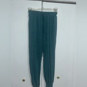 Jogger sweatpants. Green stripe patterned M